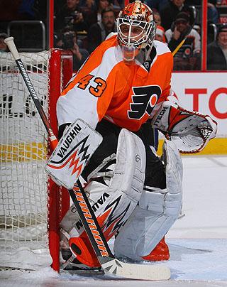 Martin Biron sporting the Flyers' 3rd jersey earlier this season, a replica of the orange worn by Parent in the '70s.